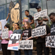 NORTH CHARLESTON, SC - APRIL 08: People participate in a rally to protest the death of Walter Scott, who was killed by police in a shooting, outside City Hall on April 8, 2015 in North Charleston, South Carolina.
Richard Ellis/Getty Images